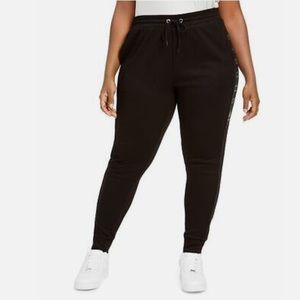 Lala Anthony. Trendy plus size jogger pants. with rhinestone lettering